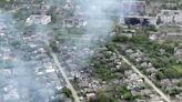 Drone footage shows Ukrainian village battered to ruins as residents flee Russian advance