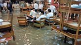 Delhi rains: Viral photo shows journalists drinking in flooded Press Club of India