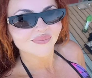 Jesy Nelson shows off her envious figure in a busty bikini top