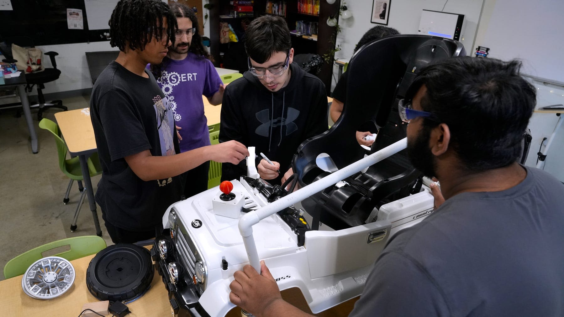 A child needed a wheelchair. These Blackstone Academy students built one out of a toy car