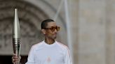 Pharrell Williams Carries Torch at Paris 2024 Olympics