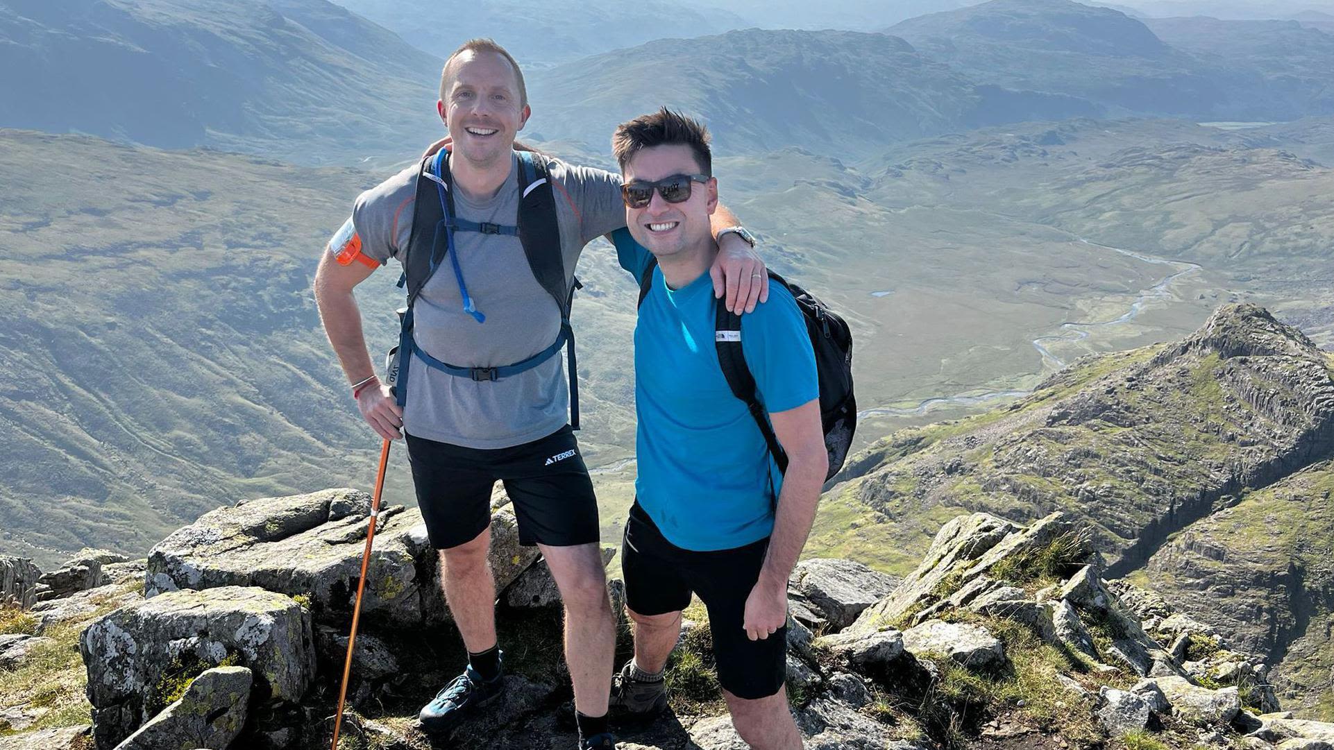 Blind lawyer and boss climb 24 peaks in 24 hours