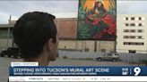 Neighbors stroll along Downtown to socialize and take in local mural art