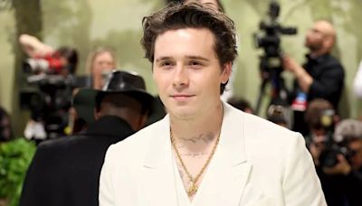 Brooklyn Beckham rushed to hospital with excruciating injury as he's pictured in hospital bed