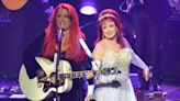 Wynonna Judd says she still talks to late mother Naomi Judd when she's performing onstage