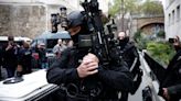 Police surround Iran's consulate in Paris as man threatens to blow himself up