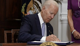 Joe Biden signs into law landmark gun control bill