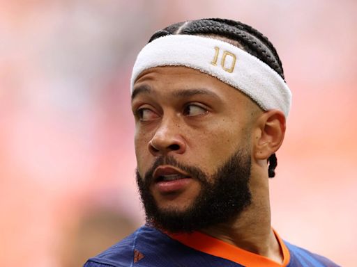 About former Man Utd striker Memphis Depay's headband and what is written on it