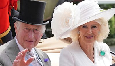 Here come the royals! King and Queen arrive side by side at Ascot