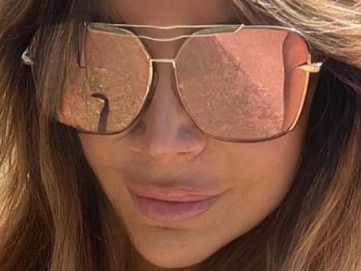 Lizzie Cundy shows off her incredible figure in a printed bikini