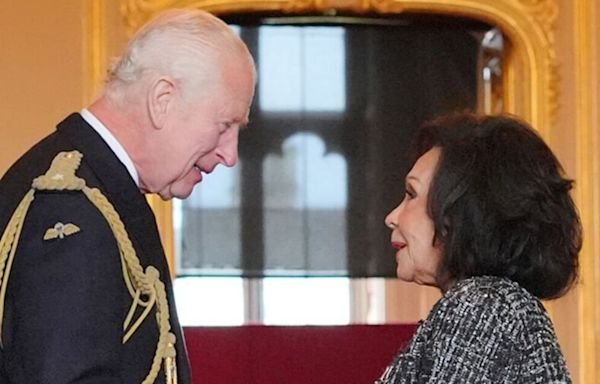 Shirley Bassey looks ageless as star breaks royal protocol with Charles in error