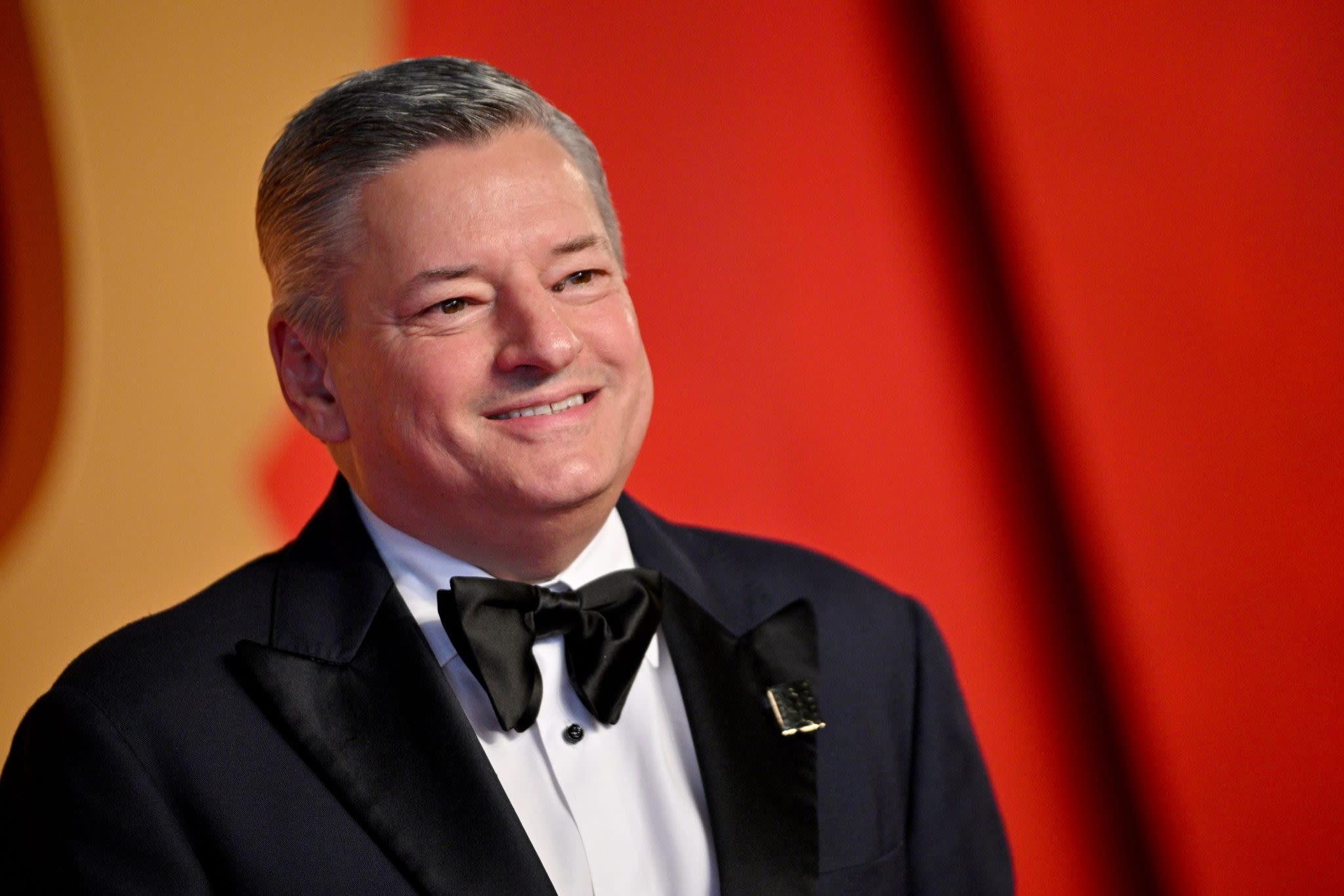 Netflix CEO Ted Sarandos says showrunners and screenwriters better start using AI—or else someone who does will take their job
