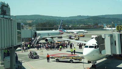 3 injured at San Francisco airport after American Airlines plane fills with smoke