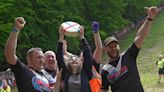 Woman wins famous UK cheese rolling race despite being knocked unconscious