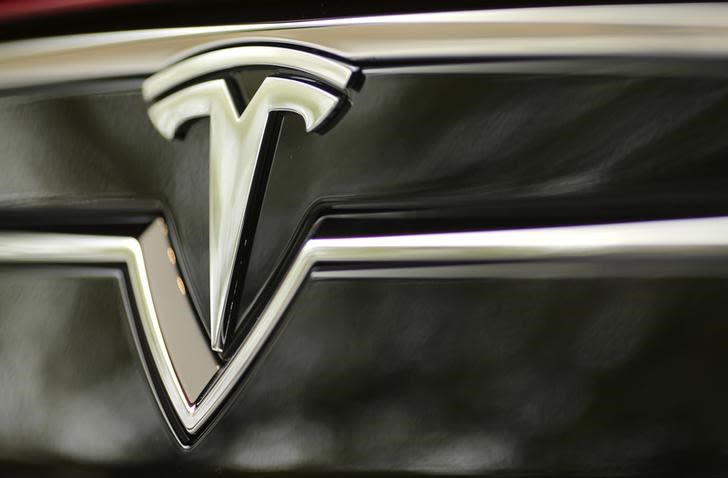 Tesla stock downgraded to Sell, analysts say 'not much to like' By Investing.com