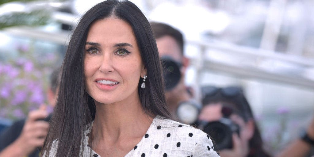 Demi Moore's sheer shaggy-hem mini dress and matching gloves are so demure