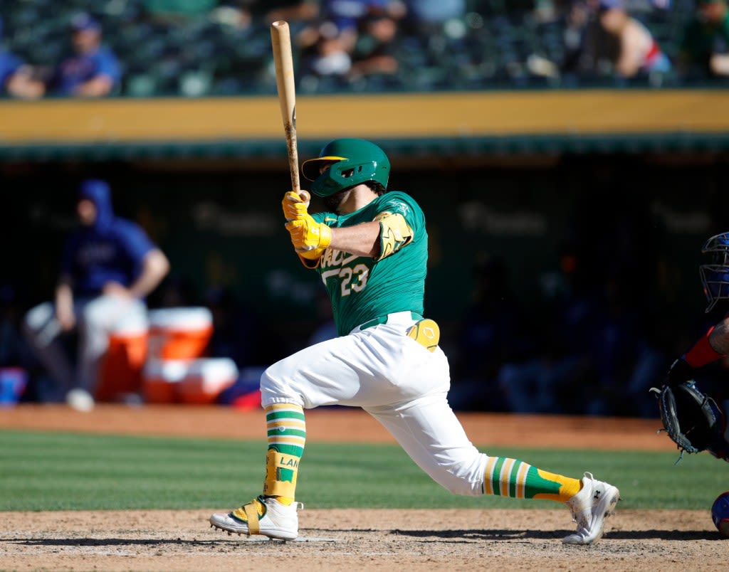 Rangers break open Game 2 late, survive late A’s rally to get doubleheader split