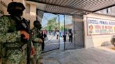Guardia Nacional vigila escuela amenazada por cobro de piso