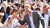 Selfies, Dogs and Handshakes! See Meghan Markle and Prince Harry Greeting Well-Wishers in Germany