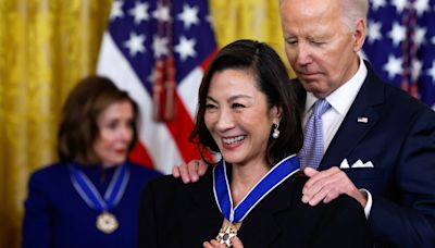 Biden gives Katie Ledecky, Michelle Yeoh the Medal of Freedom