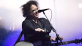 Ticketmaster will give Cure fans a refund after Robert Smith said he was 'sickened' by its additional charges and demanded an explanation