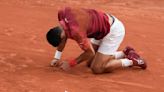 Novak Djokovic's French Open title defense and stay at No. 1 end because of an injured knee