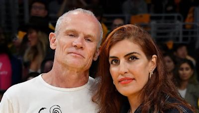 Red Hot Chili Peppers' Flea and wife Melody Ehsani join Selma Blair to watch the Lakers lose 105-112 to the Denver Nuggets