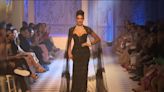 Jacqueliene Fernandez Dazzled In A Shimmering Black Strapless Gown And Lace Cape On The Rose Room Runway