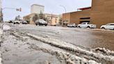 ‘We call this heart attack snow’: Wet snow blankets Saskatoon