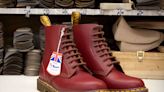 Dr. Martens shares plunge 30% to all-time low, trading briefly halted on weak outlook