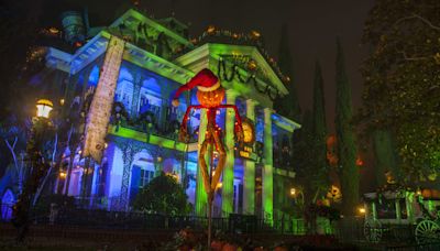 Disneyland's Haunted Mansion reopens in holiday mode after 6-month refurbishment