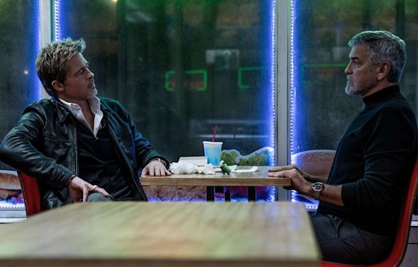 'Wolfs' Clip: George Clooney and Brad Pitt Grill Amy Ryan as Rival Fixers in a Sticky Situation (Exclusive)