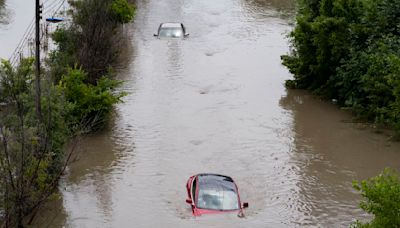 Water rescues underway in Arkansas after a new wave of storms across US and Canada