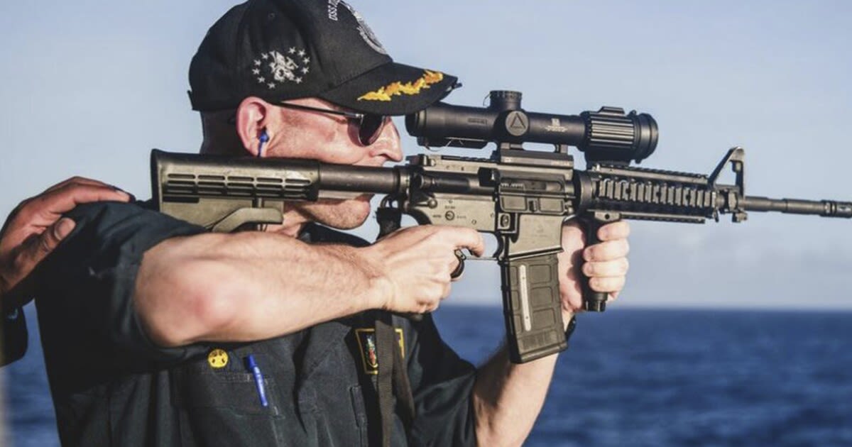 Navy commander relieved of duty after photo showed him firing rifle with scope backward