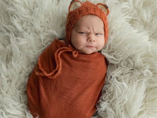 Grumpy baby photoshoot goes viral: 'He was just scowling'
