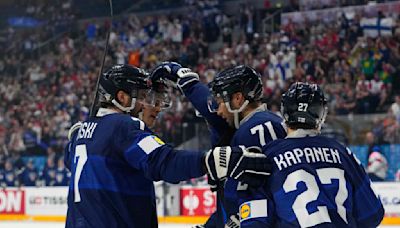 Bedard scores 2 again as Canada downs Denmark at hockey worlds
