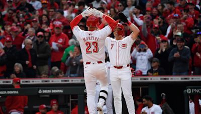 Martini homers twice, Reds beat Nationals 8-2 on opening day