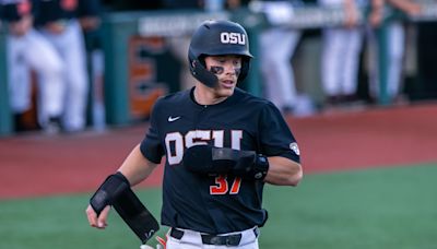 Oregon State baseball beats Nevada, but Travis Bazzana leaves with apparent hand or wrist injury