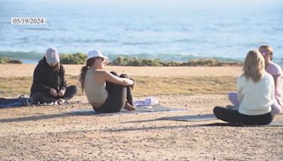 Battle over beachfront yoga classes in San Diego has turned into legal fight