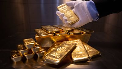 Gold eases off as dollar regains ground