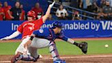 Jansen homers, drives in winner in 11th as Jays beat Cubs