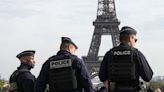 A Paris judge questions 3 men suspected of ‘psychological violence’ at Eiffel Tower