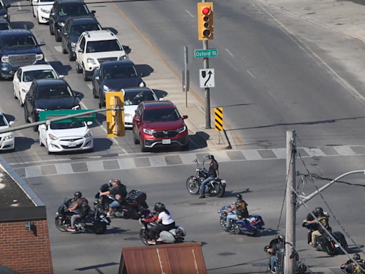 Red-light runners: London motorcycle procession caught on camera