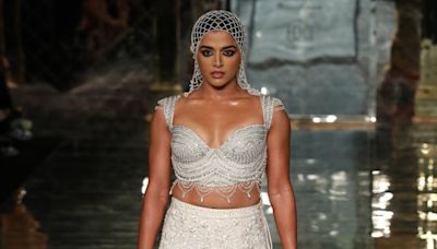 Wamiqa Gabbi Captivates in Abu Sandeep's Ivory Trail Lehenga and Webbed Headgear On Day 1 of ICW 2024 - News18