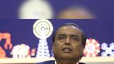 Ambani, Adani wooing mom-and-pop investors into financial markets