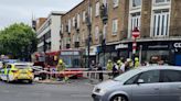 Woman taken to hospital after crashing into traffic light in Mitcham