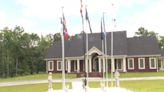 ‘I believe in God and country’: Veteran pays tribute to military with decorated front yard memorial