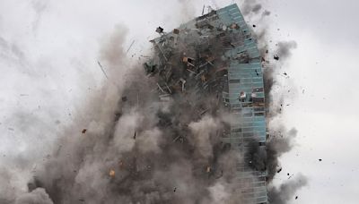 Jaw-dropping moment hurricane-damaged skyscraper implodes in Louisiana