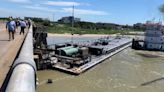 Barge hits bridge in Texas, spills oil and shuts road