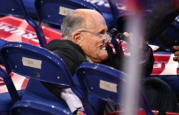 Rudy Giuliani Crashes Into Empty Chairs After Bizarre Fall At RNC